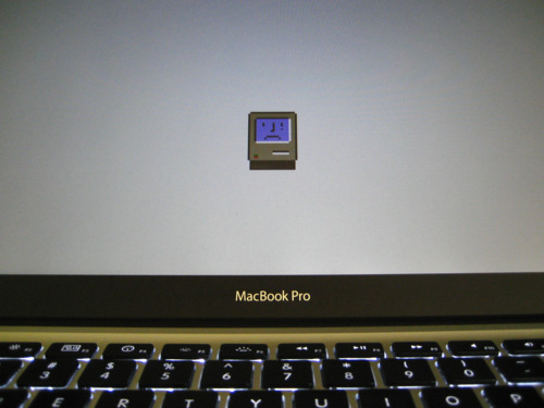 MacBook Pro with “sad mac” icon